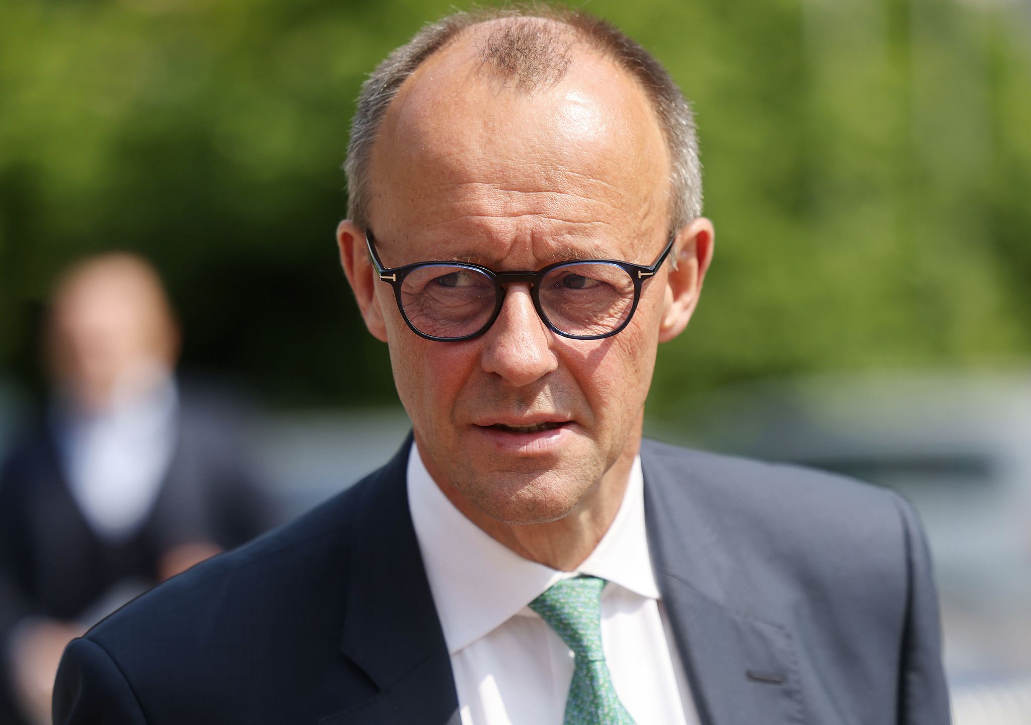 Merz rät Scholz zu Ukraine-Reise