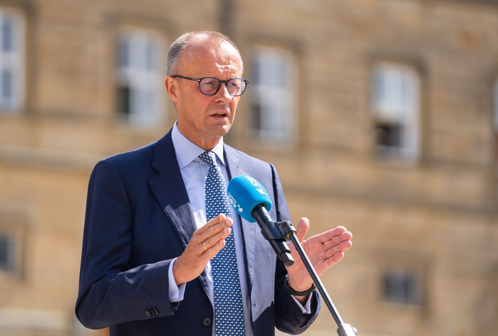 Merz wünscht sich in Krisen mehr Optimismus