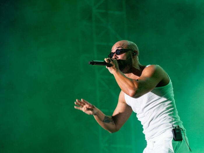 A man with a microphone on a stage