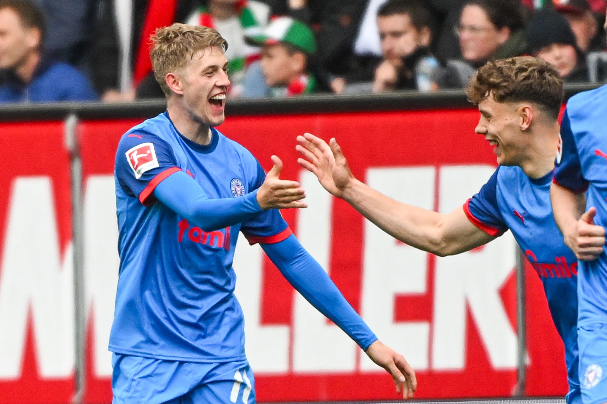 Holstein Kiel auf Relegationskurs nach Sieg gegen Augsburg