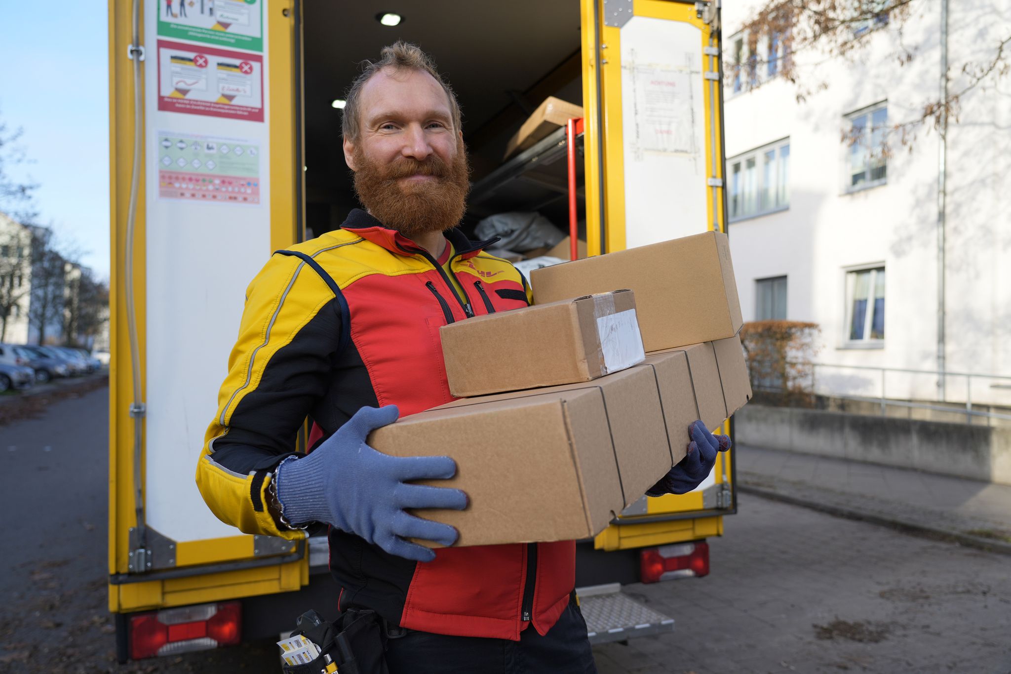 Stress und Dankbarkeit: Das Leben eines DHL-Paketboten