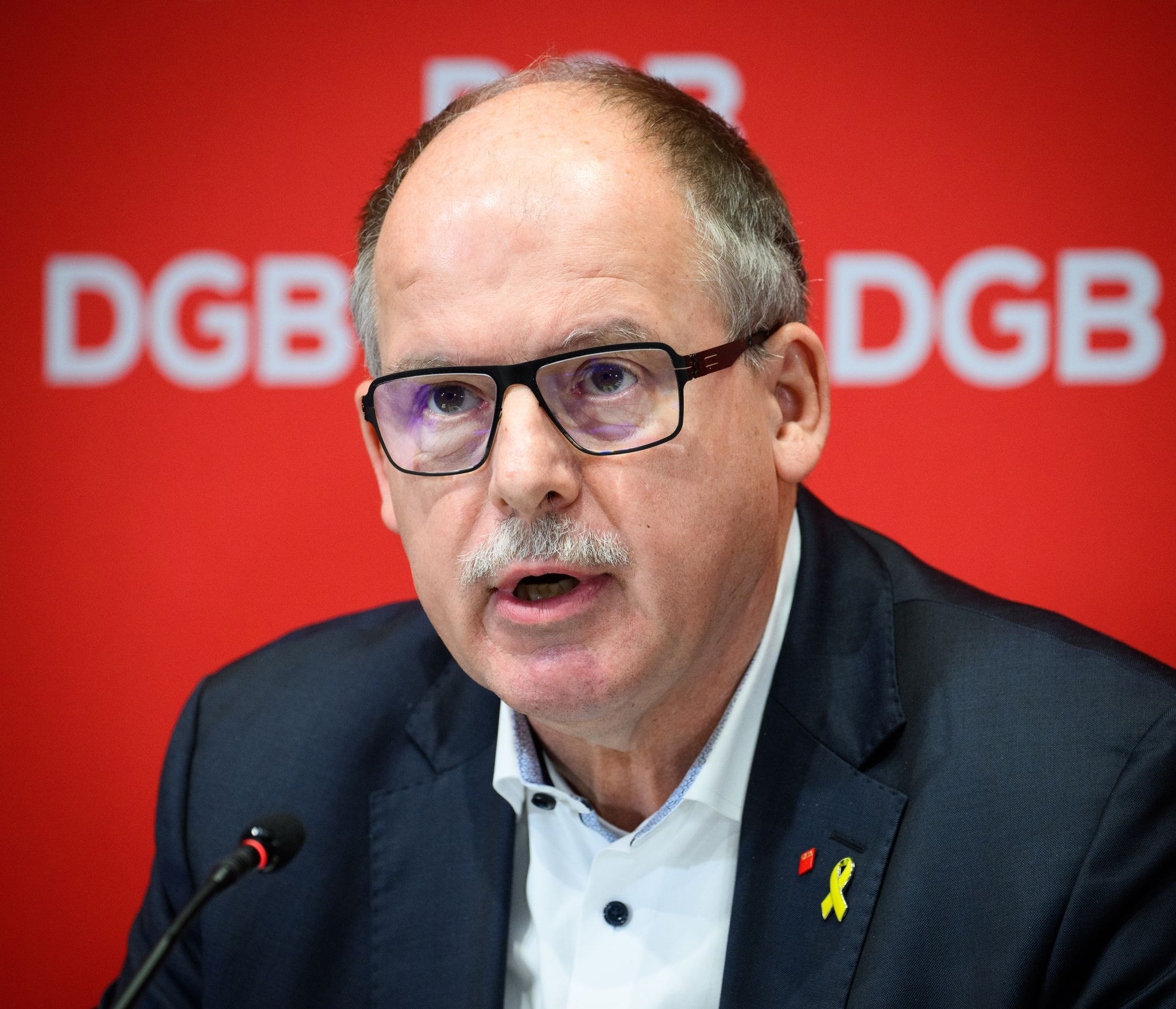 Streit um Tarifbindung: DGB kritisiert CDU-geführte Bundesregierung